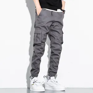Men's casual gray cotton cargo jogger pants with multi-pockets and elastic cuffs