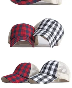 Close-up view of plaid baseball caps with breathable mesh back and pony tail opening design.