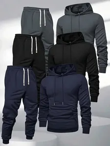Detailed view of men's plain tracksuit sets including hoodie and pants in navy, black, and grey