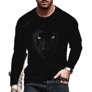 Close-up of men's black long-sleeve T-shirt featuring a green-eyed panther print.