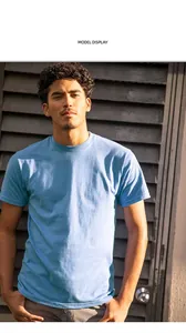 Professional male model wearing light blue heavy ring-spun cotton oversized crew neck t-shirt