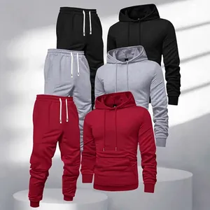 Three-piece men's autumn winter hoodie and sweatpants tracksuit set in black, grey, red.