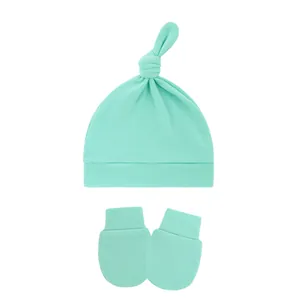 Soft mint green baby knotted beanie hat and matching anti-scratch mittens set for newborn