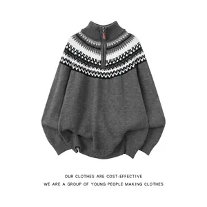 Detailed view of Fair Isle knit sweater with quarter-zip mock neck in grey