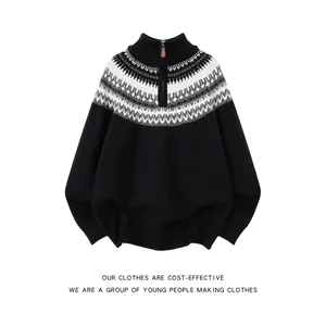 Detailed close-up of a black Fair Isle knit sweater featuring a half-zip high neckline