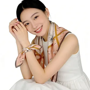 Elegant rose pattern mulberry silk square scarf worn as a neck and wrist accessory