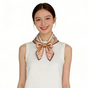 Elegant pink square mulberry silk scarf with a floral pattern styled on a model