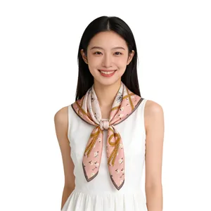 Elegant pink mulberry silk square scarf with floral print worn by a female Asian model