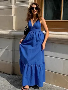 Stylish blue V-neck cotton linen maxi dress featuring an A-line flowy summer silhouette