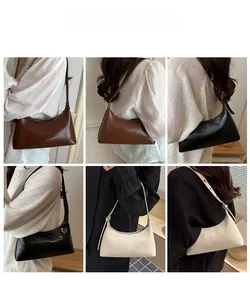 Chic minimalist underarm shoulder bag in black brown and white leather