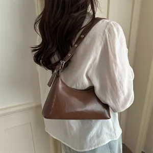 Vintage glossy brown underarm shoulder bag with adjustable grommet strap for women