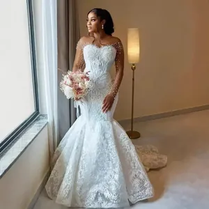 Elegant lace mermaid wedding dress with sheer pearl sleeves and long train