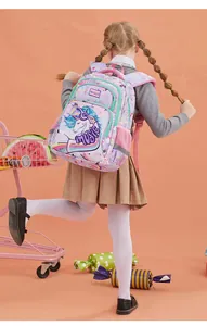 Ergonomic purple children's school backpack featuring a unicorn print on a young girl model back view