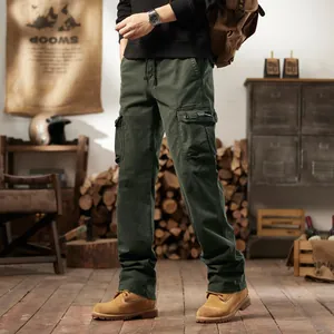 Men's olive green multi-pocket cotton cargo pants for outdoor hiking and casual tactical wear