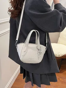 Elegant white lychee textured tote bag featuring a detachable crossbody shoulder strap
