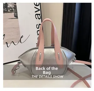 Detailed back view of a stylish silver and pink metallic bucket handbag for women