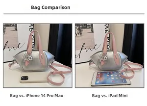 Silver crossbody bucket bag size comparison with iPhone 14 Pro Max and iPad mini