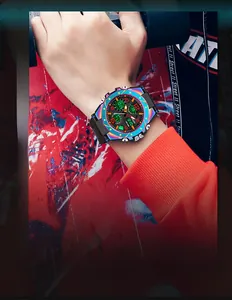 Close-up of the iridescent sports watch on wrist with a colorful graffiti background.