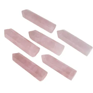 Set of six natural rose quartz hexagonal crystal pillars for aesthetic home decoration
