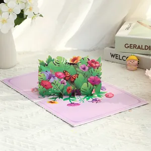 3D pop-up greeting card featuring a colorful floral garden and butterfly