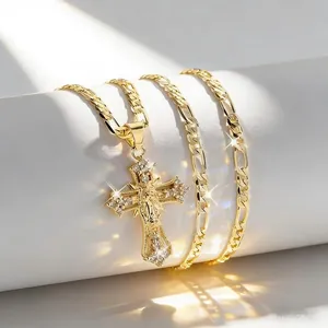 Religious gold cross pendant necklace with Figaro chain and sparkling crystals