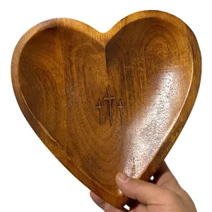Unique handcrafted heart-shaped wooden prayer bowl with engraved three crosses motifs