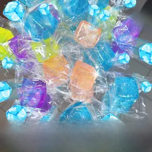 Macro detail of glitter-filled colorful ice cube squishy toys for stress relief