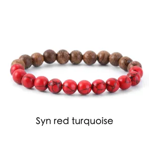 Detail view of red synthetic turquoise and wood grain bead bracelet