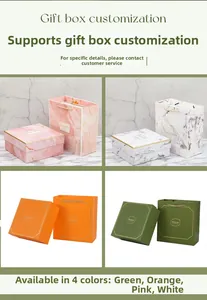 Variety of elegant gift box and bag sets in four distinct colors and patterns.