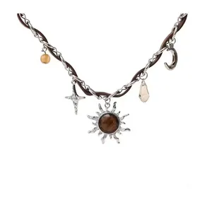 Vintage brown leather and silver chain necklace with sun and star pendants for Y2K look