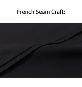 Détail du savoir-faire de la couture française durable sur une nuisette en satin noir élégante