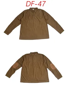 Detail of brown men's corduroy long sleeve Polo shirt featuring classic elbow patches