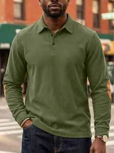 Close-up of olive green corduroy long sleeve polo shirt with elbow patches for men.