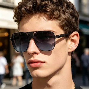 Close-up view of a male model wearing classic black square metal aviator sunglasses.