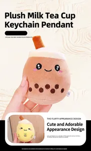 Close-up of plush milk tea cup keychain with cute embroidered expression and boba pearls