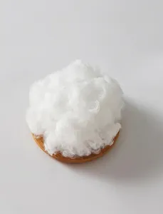 Macro view of high-quality white fluffy PP cotton stuffing used in plush pendants