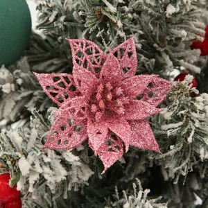 Detailed close-up of glittery pink hollow poinsettia flower for Christmas trees
