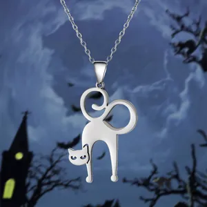 Detailed close-up of a silver cat pendant necklace set against a spooky Halloween background