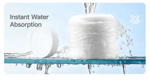 Detail of compressed bath towel expanding instantly with water for travel convenience.