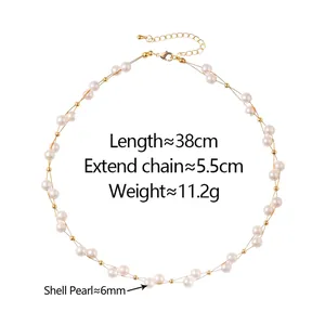 Collier de perles Swarovski élégant avec perles dorées sur fond blanc avec dimensions.