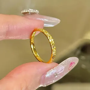 Close-up detail showing the unique gold hammered texture of this adjustable ring