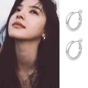 Minimalist S999 sterling silver hoop earrings for ear care with sleek C-shape design