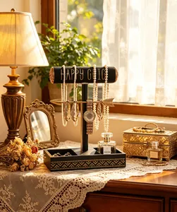 Detailed view of the T-shaped double jewelry display stand with elegant gold arrow bar
