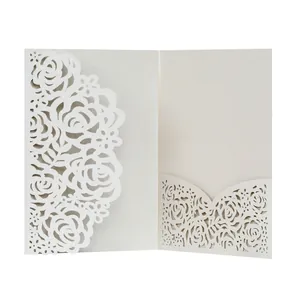 Detail view of pearlescent silver laser-cut rose wedding invitation card with pocket