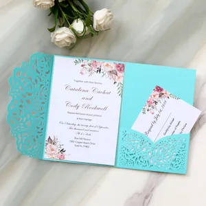 Elegant teal laser-cut wedding invitation card with floral printed insert and RSVP card