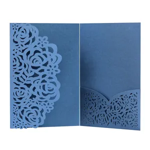 Detail view of navy blue laser cut rose pattern wedding invitation card with inner pocket