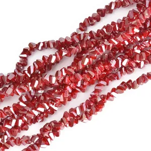 Macro view of 4mm red faceted triangle glass crystal beads for DIY jewelry making