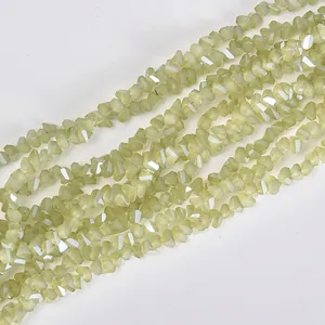 Close-up of 4mm triangle faceted electroplated glass beads for DIY jewelry