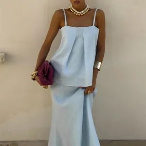 Elegant summer light blue linen-like camisole top and long skirt two-piece set