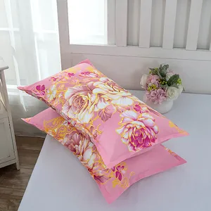 Detailed view of pink floral pattern on a pair of soft minimalist pillowcases